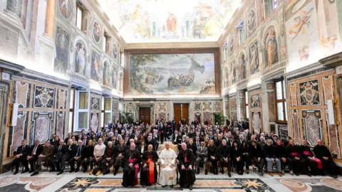 Reuters Pope Leo sits for a picture on the day of an audience with international filmmakers and actors, including Cate Blanchett, Spike Lee, Monica Bellucci, Viggo Mortensen and Gus Van Sant, in the Sala Clementina at the Vatican. 
