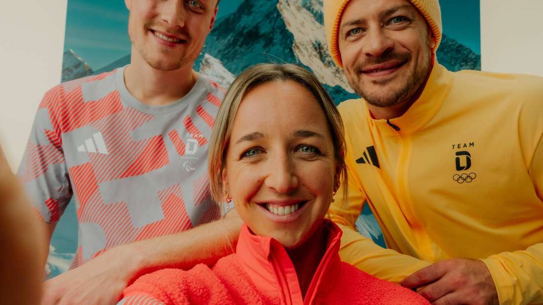 Olympia: Franziska Preuß (Biathlon, Mitte), Moritz Müller (Eishockey, rechts) und Jan Malte Brelage (Para-Eishockey, links) präsentieren die Outfits im Olympischen Dorf.