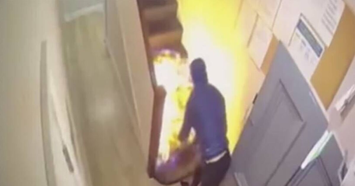 Moment suspected arsonist set fire to center for asylum seekers - World News - News