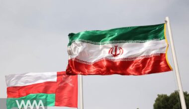 The flags of Iran and Oman are seen when Oman's Sultan Haitham bin Tariq arrives at Mehrabad Airport in Tehran, Iran May 28, 2023. Majid Asgaripour/WANA (West Asia News Agency)