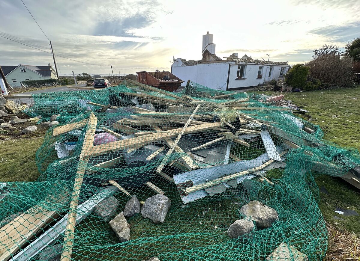 The home of Maureen Folan in Carna Village in Connemara which had its roof blown off from 180km winds during Storm Eowyn. The joint report claim that, without action, the impact of extreme weather events will put the country’s economic and financial resilience to the test with as much as €2.2bn a year needed by 2030 in annual adaptation expenditure. File photo: Eamonn Farrell / © RollingNews.ie