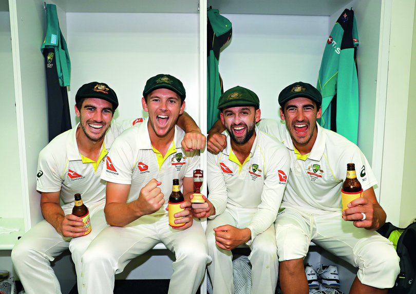 PERTH, AUSTRALIA - DECEMBER 18:  Pat Cummins, Josh Hazlewood, Nathan Lyon and Mitchell Starc of Australia celebrate in the changerooms after Australia regained the Ashes during day five of the Third Test match during the 2017/18 Ashes Series between Australia and England at WACA on December 18, 2017 in Perth, Australia.  (Photo by Ryan Pierse/Getty Images)