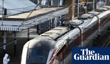 Two men in police custody after mass stabbing on Cambridgeshire train | UK news