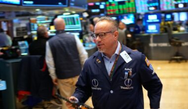Wall Street gains ground amid steady flow of earnings reports, upbeat economic updates :: WRAL.com
