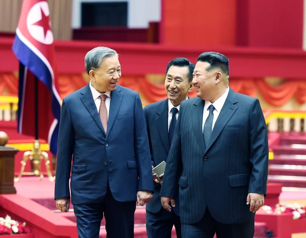 Vietnam’s To Lam talks with North Korean leader Kim Jong-un (right) before a meeting in Pyongyang, North Korea, last month. Photo: VNA/AP