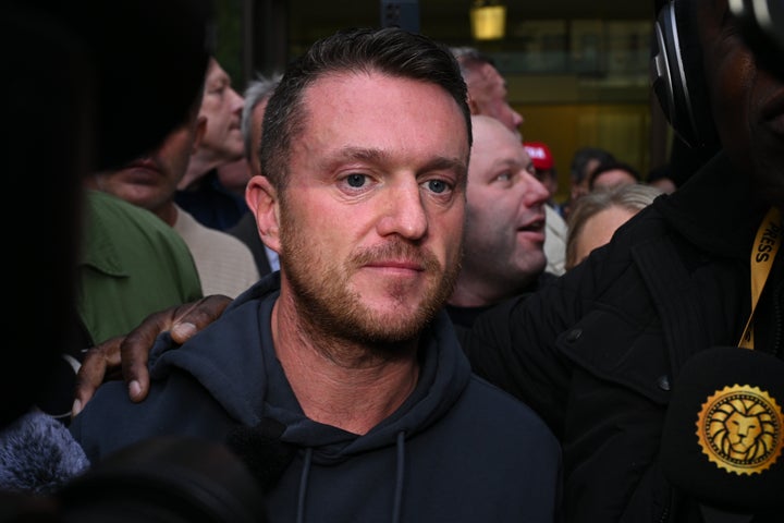 Tommy Robinson, real name Stephen Yaxley-Lennon, leaves Westminster Magistrates' Court after being found not guilty of terror-related charge.