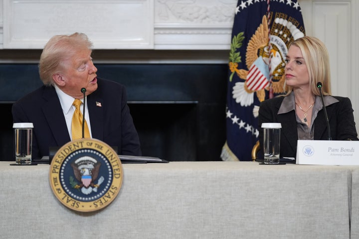 President Donald Trump speaks during a roundtable on criminal cartels in the State Dining Room of the White House, Thursday, Oct. 23, 2025, in Washington, as Attorney General Pam Bondi listens. (AP Photo/Evan Vucci)