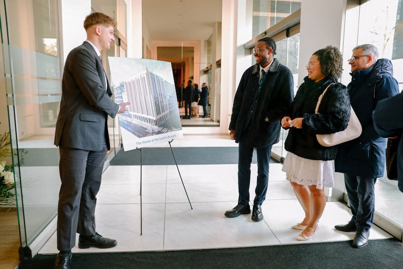 Attendees talk before the site dedication of the Brussels Belgium Temple in Brussels, Belgium, on Saturday, Nov. 22, 2025.