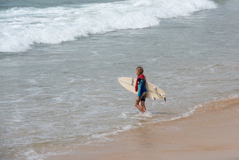 A surfer prepares to catch a wave during Coffs Soul Surfest in Coffs Harbour, Australia, Sept. 26-29, 2025.