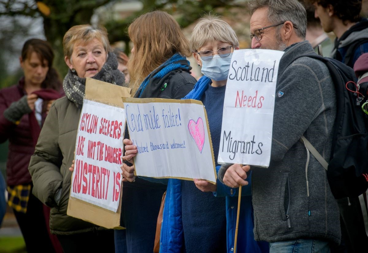 Asylum seekers plan supporters welcome the 300 men who could be housed at Cameron Barracks in Inverness