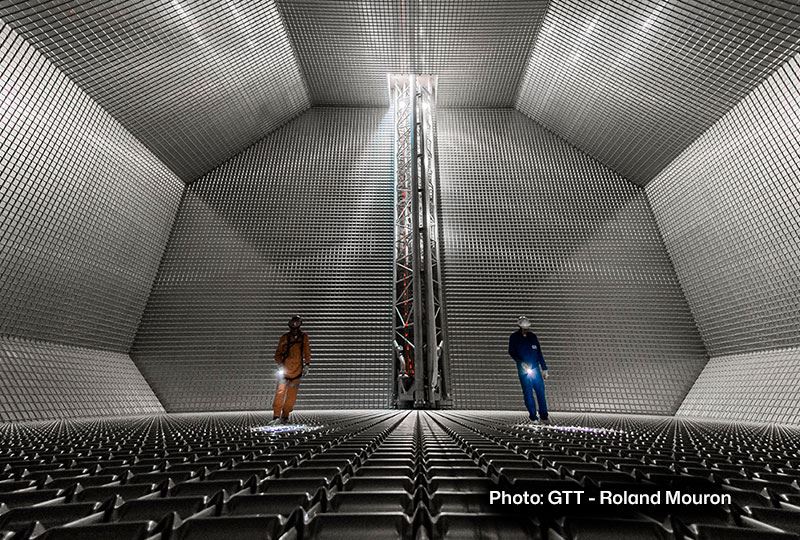 People in a room with a tall tower AI-generated content may be incorrect.