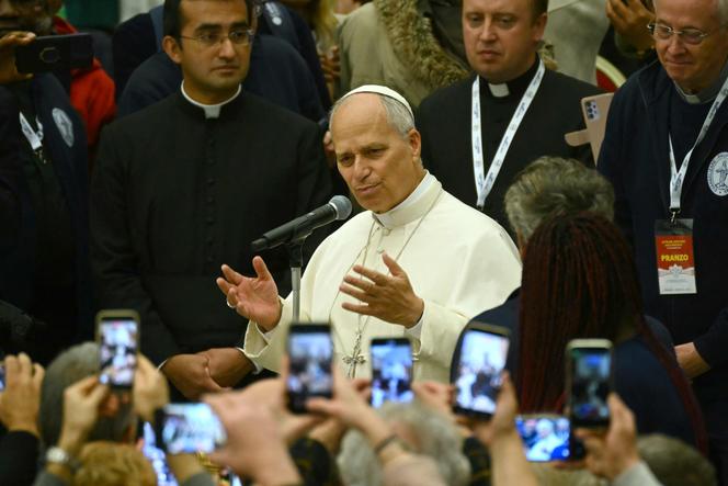 Pope Leo XIV attends a lunch organised on the World Day of the Poor at the Paul VI audience hall in The Vatican, on November 16, 2025. (Photo by Filippo MONTEFORTE / AFP)
