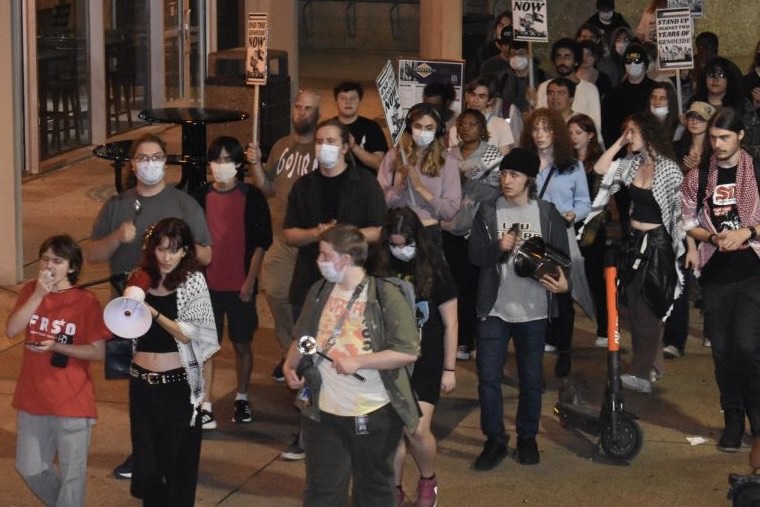 Louisiana State University students rally outside their Student Union with chants and signs in support of a free Palestine.