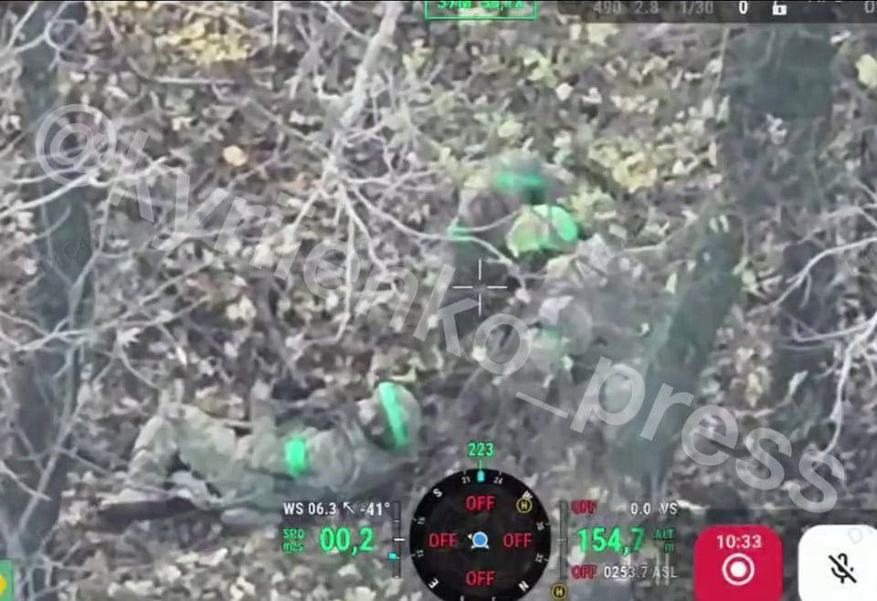 Evidence of Russian soldiers wearing Ukrainian colors (green tape) to move around Pokrovsk published by the AFU. The Russians who were wearing green tape were killed and their dog tags together with photos of their dead bodies were taken as evidence. Nov 2025