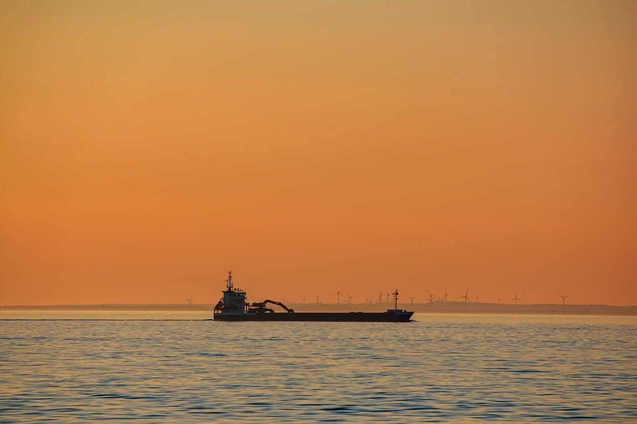 A sunset over a fuel tanker by Sebastian via Pixabay