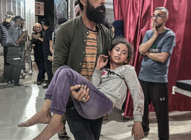 Injured Palestinians including children are brought to hospital.