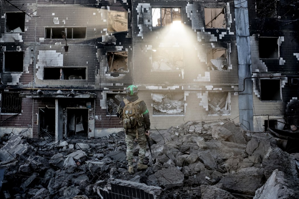 A Ukrainian serviceman stands among the rubble in the courtyard of a destroyed residential building in Kostyantynivka, Ukraine's Donetsk region, on November 15, 2025. Photo: Oleg Petrasiuk/24th Mechanized Brigade of Ukrainian Armed Forces/AFP.