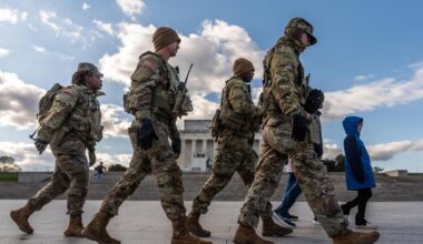 U.S. halts asylum decisions as troop killing sparks migrant crackdown