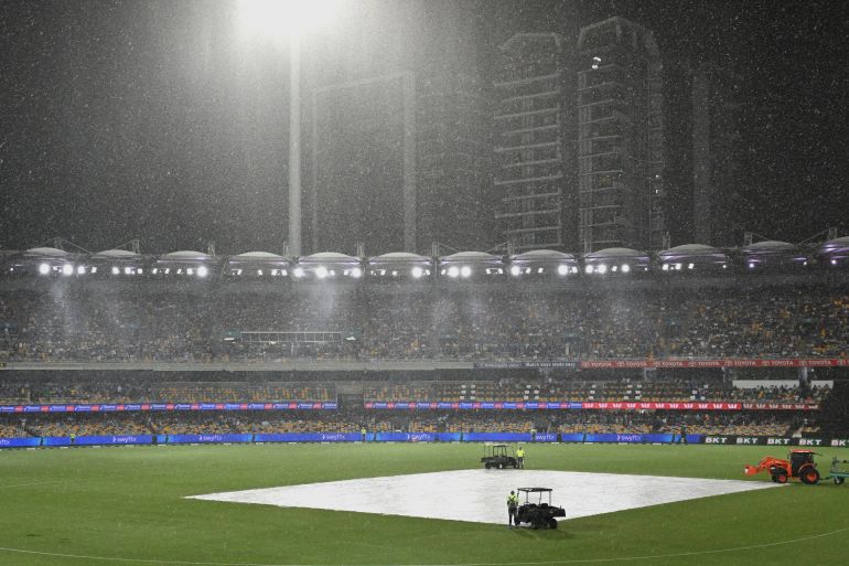 Rain falls during a T20 cricket international between India and Australia in Brisbane, Australia, Saturday, Nov. 8, 2025. (Darren England/AAPImage via AP)