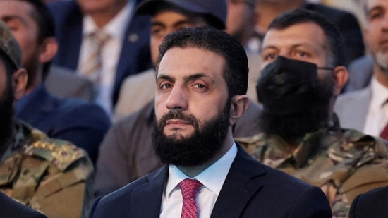 Syria’s interim President Ahmed al-Sharaa looks on as he attends the “Aleppo, Key to Victory” celebration marking Syria’s liberation in May (REUTERS/File)