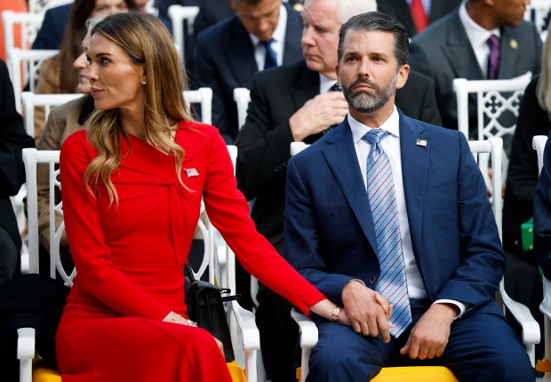 WASHINGTON, DC - OCTOBER 14: Donald Trump Jr. (R) sits with his girlfriend Bettina Anderson prior to a Presidential Medal of Freedom ceremony in the Rose Garden of the White House on October 14, 2025 in Washington, DC. Today marks the National Day of Remembrance for Charlie Kirk who was shot and killed on September 10th at Utah Valley University. (Photo by Kevin Dietsch/Getty Images)