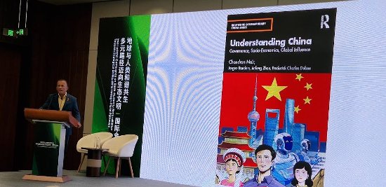 Chandran Nair giving a talk at the Shanghai meeting.