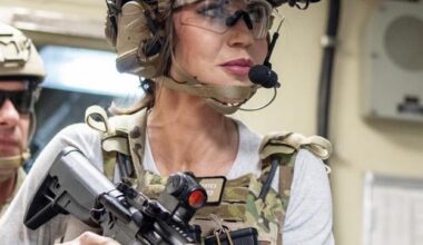 Kristi Noem trying to convince her dog to take a walk.