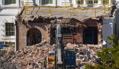 A worker walked among debris from a largely demolished part of the East Wing of the White House. President Trump has raised money from private donors to pay for the work, raising worries about potential conflicts of interest.