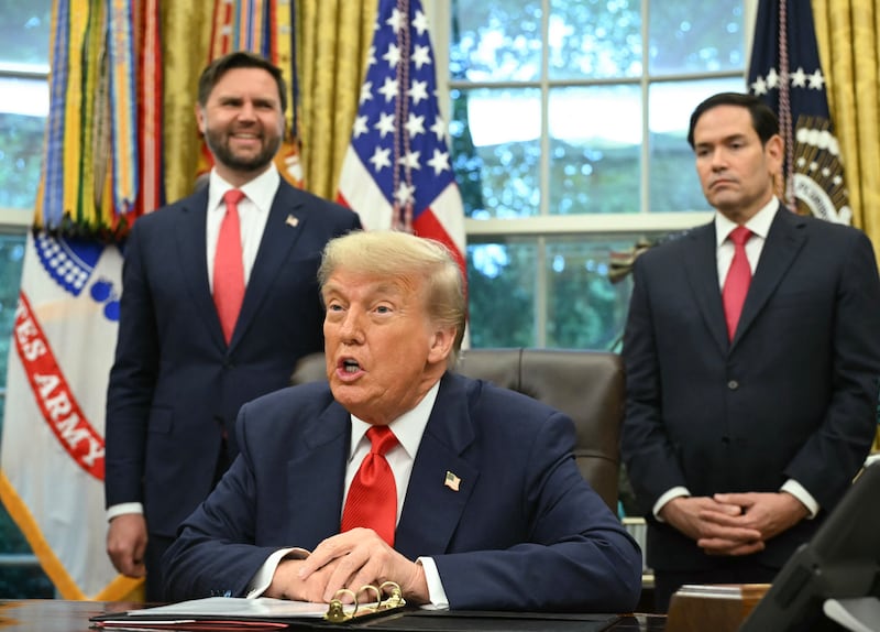 President Donald Trump is flanked by  Secretary of State Marco Rubio and Vice President JD Vance (L) during a meeting in the White House in Washington, D.C. on June 27, 2025.