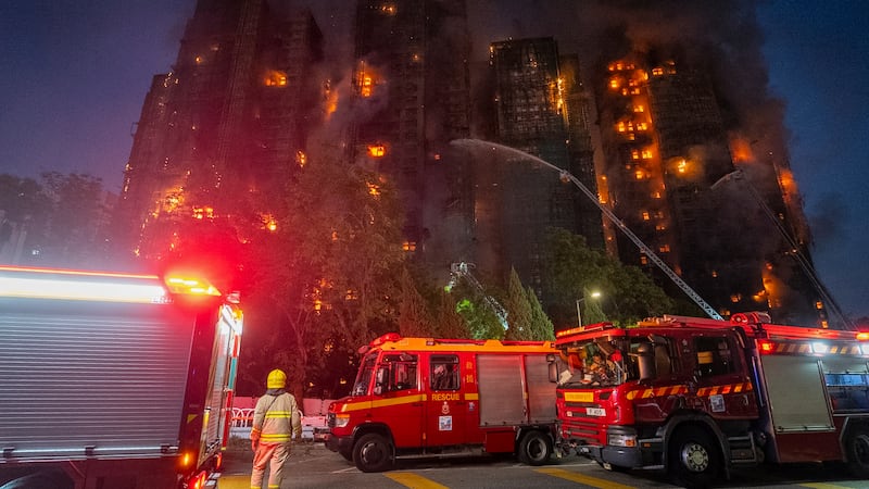 Three arrested in Hong Kong as tower blocks fire leaves at least 44 dead