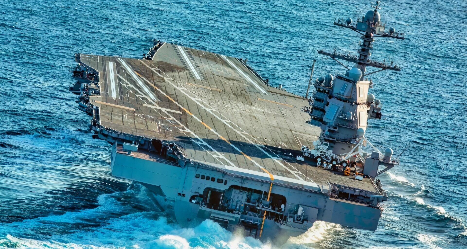 ATLANTIC OCEAN (Oct. 29, 2019) USS Gerald R. Ford (CVN 78) conducts high-speed turns in the Atlantic Ocean. Ford is at sea conducting sea trials following the in port portion of its 15 month post-shakedown availability. (U.S. Navy photo by Mass Communication Specialist 3rd Class Connor Loessin)