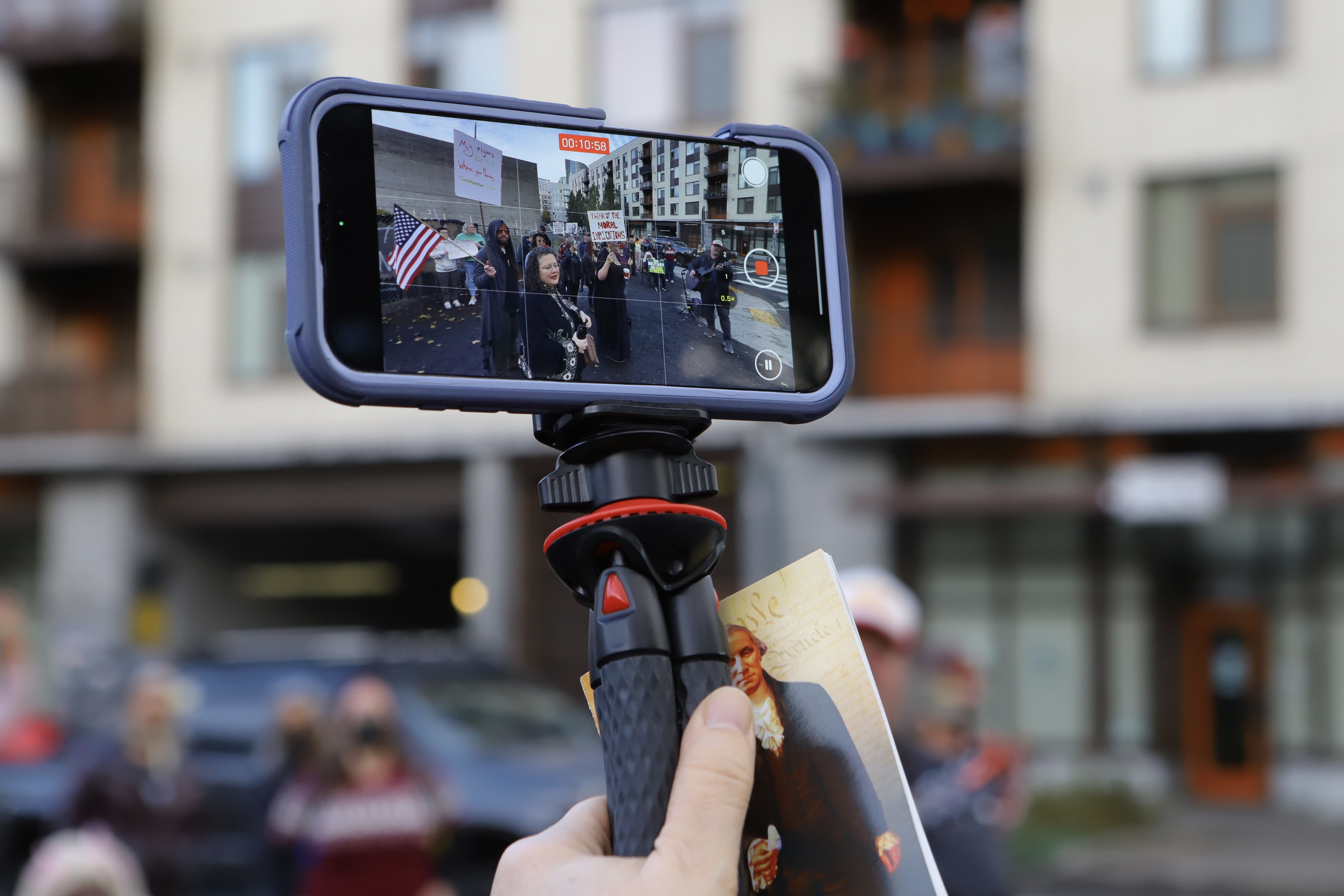 Protests continue outside the U.S. Immigration and Customs Enforcement building in South Portland on Saturday, Nov. 1, 2025.