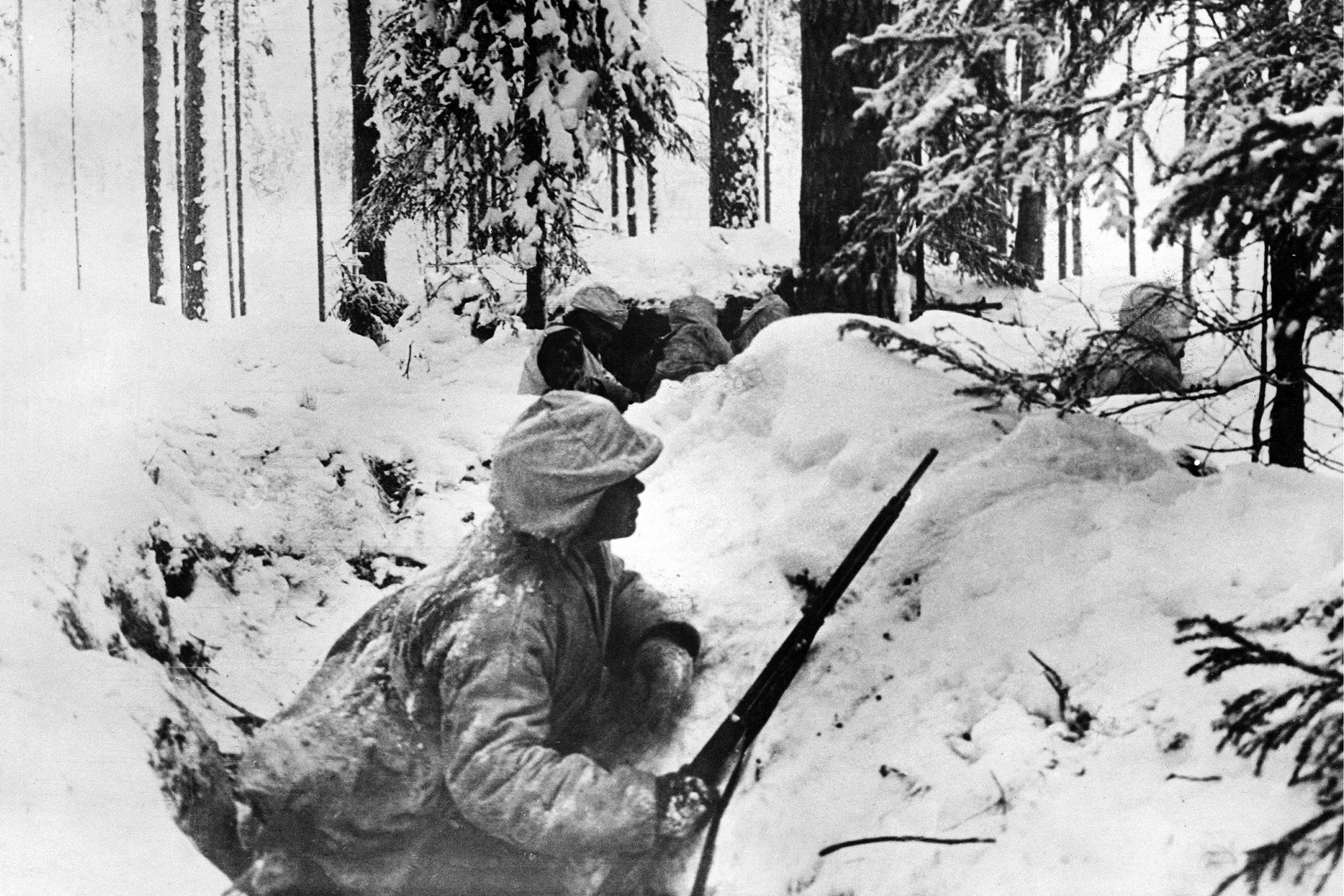Before the Soviet Union, baffled and finally broken by Finnish resistance (above), signed a peace treaty in March 1940, it had lost more than 130,000 Russian soldiers