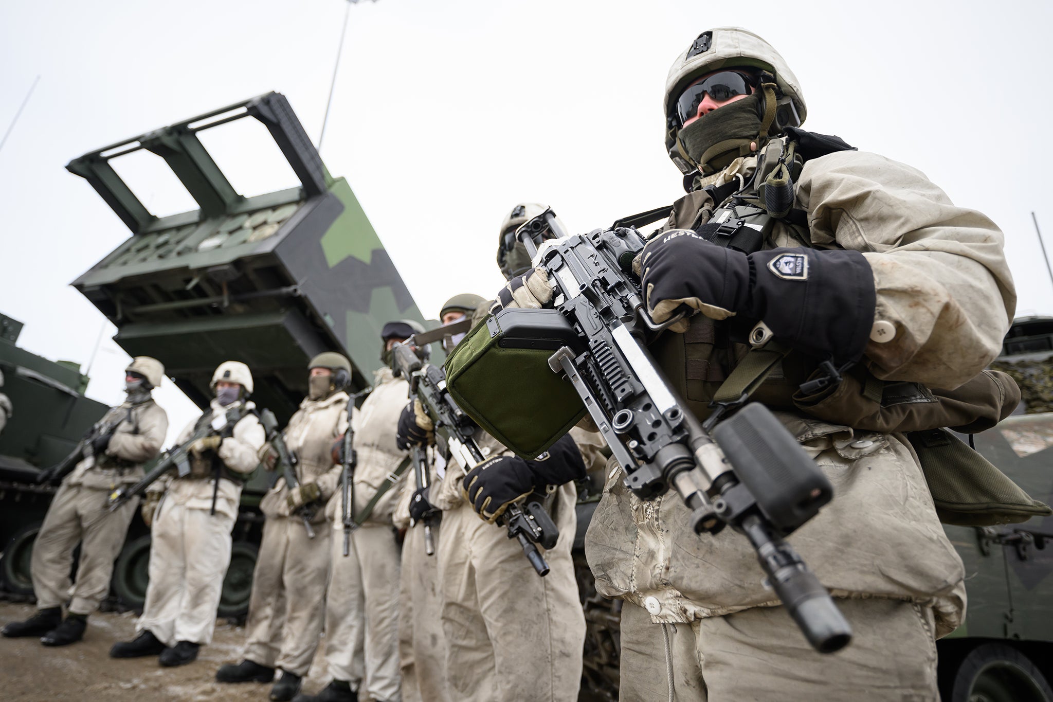 Swedish soldiers wait to take part in a training exercise on the Finland/Norway border during the Nordic Response military exercise on 9 March 2024 in Kivilompolo, Finland.