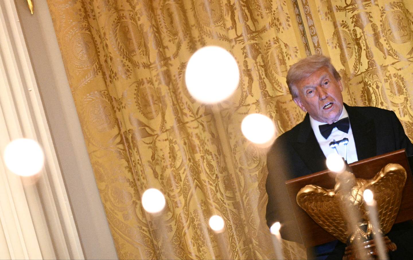 President Donald Trump speaks during an official dinner with Crown Prince and Prime Minister of the Kingdom of Saudi Arabia Mohammed bin Salman in the East Room of the White House in Washington, DC, on November 18, 2025.