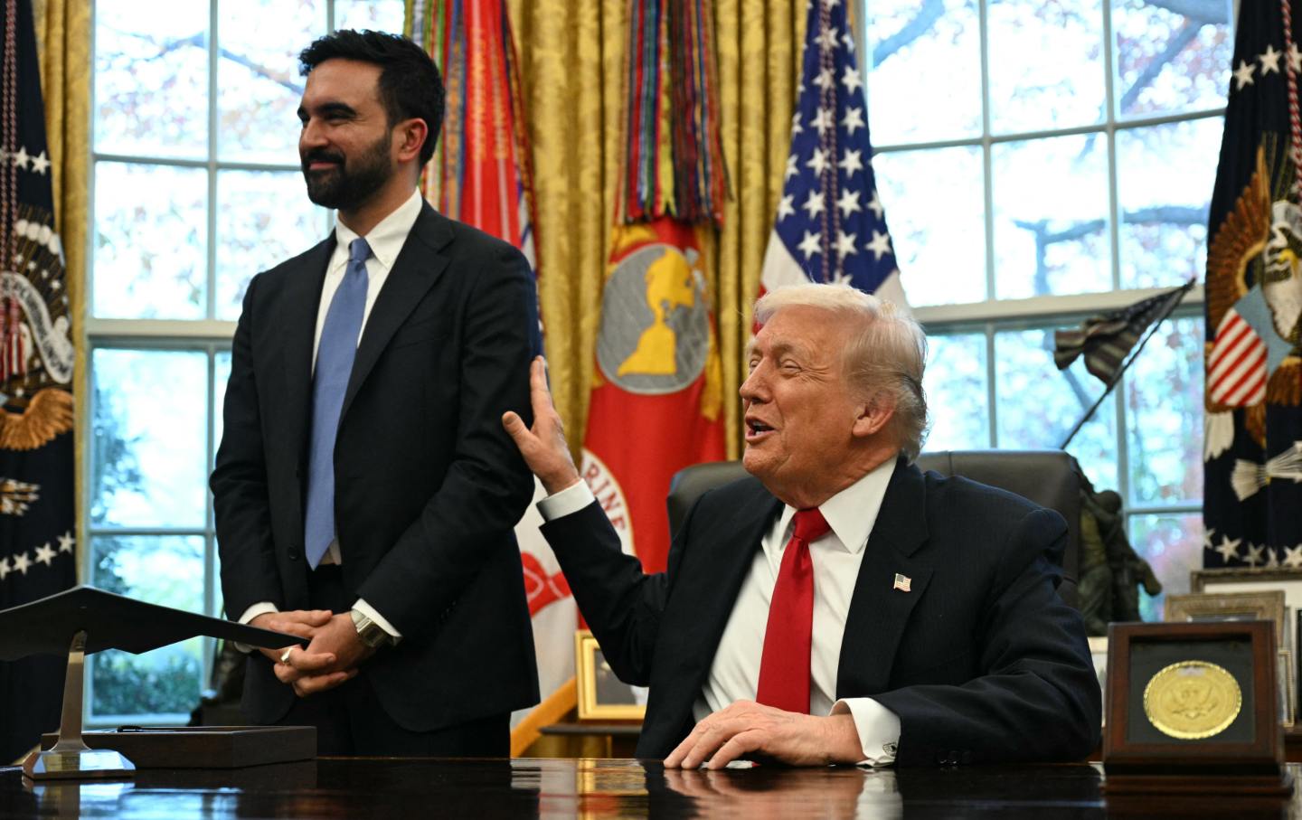 Donald Trump (R) meets with New York Mayor-elect Zohran Mamdani in the Oval Office of the White House in Washington, DC, on November 21, 2025.