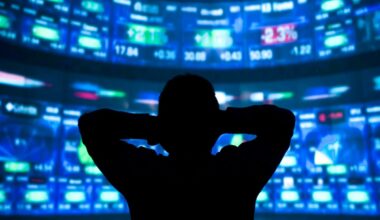 young man standing in front of the projection reflected stock market