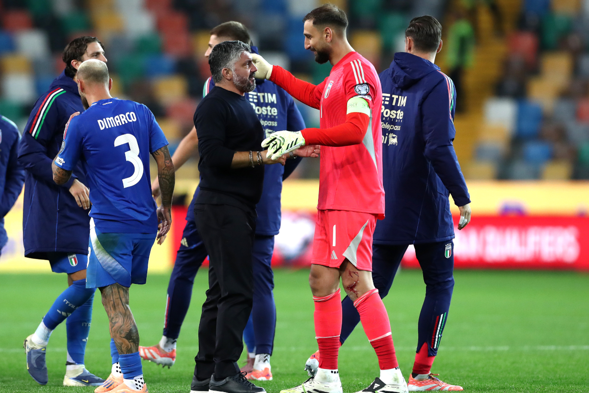 UDINE, ITALY - OCTOBER 14: Gennaro Gattuso, Head Coach of Italy, interacts with Gianluigi Donnarumma of Italy after the team