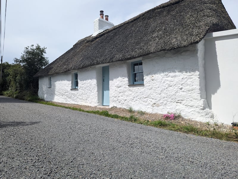 Goggin Cottage boasts a traditional thatch roof 