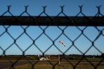 A windsock blows at the city-owned Newport Municipal Airport which has housed a U.S. Coast Guard helicopter for decades.