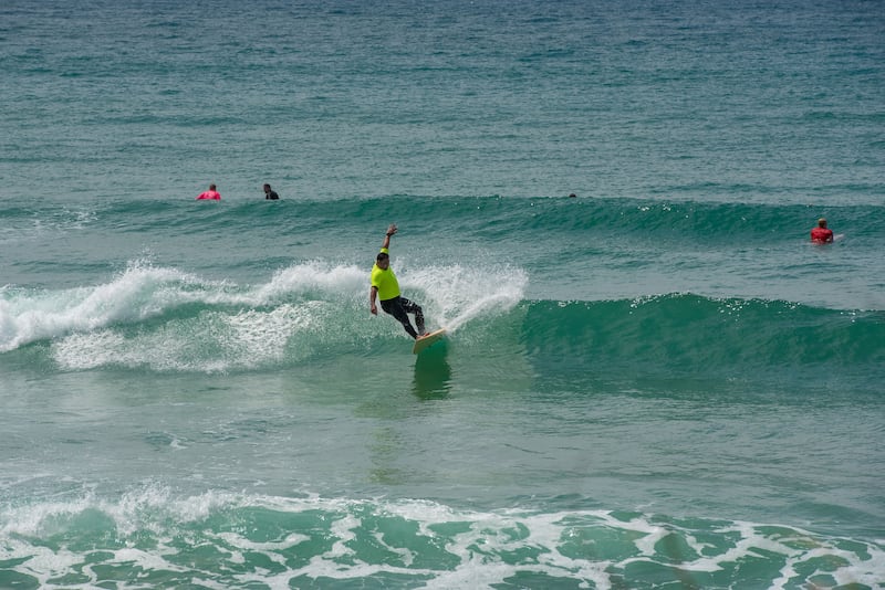 A surfer catches a wave during Coffs Soul Surfest in Coffs Harbour, Australia, Sept. 26-29, 2025.