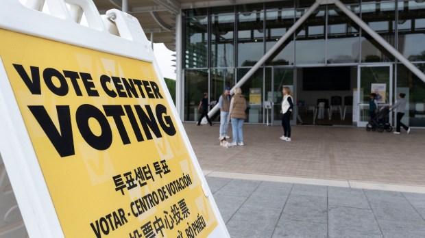 Voters go to the Newport Beach Civic Center in Newport...