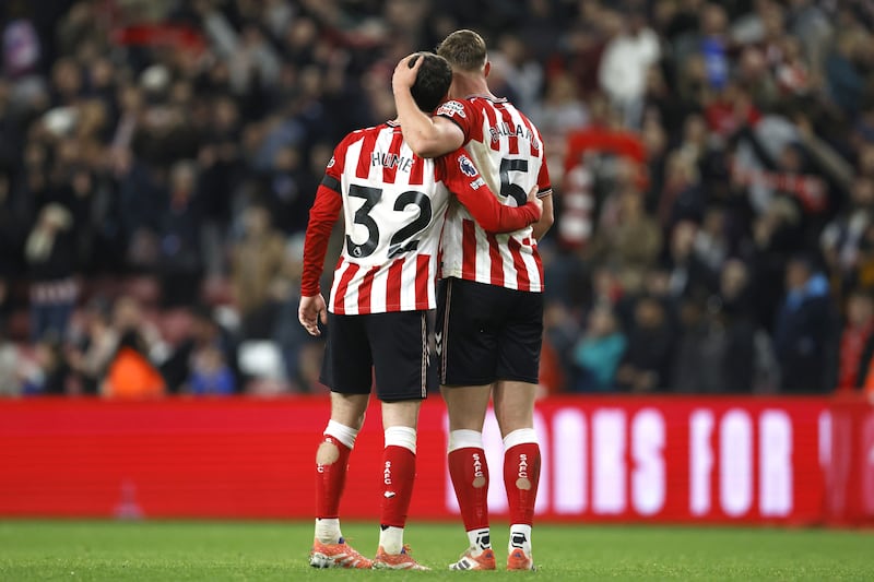 Sunderland’s Daniel Ballard (right) and Trai Hume celebrate after the final whistle