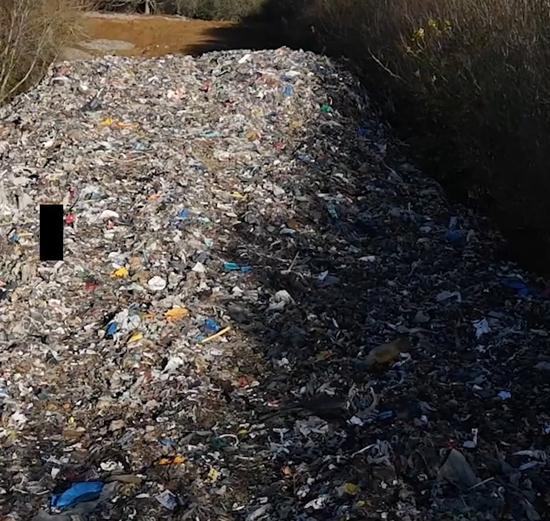 Man arrested after 150m of rubbish dumped in Oxfordshire field