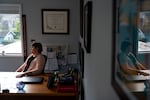 Kate Sinkins, who some say is the Oregon coast’s sole immigration lawyer, is interviewed by OPB at her desk on Nov. 17, 2025, in Newport, Ore.