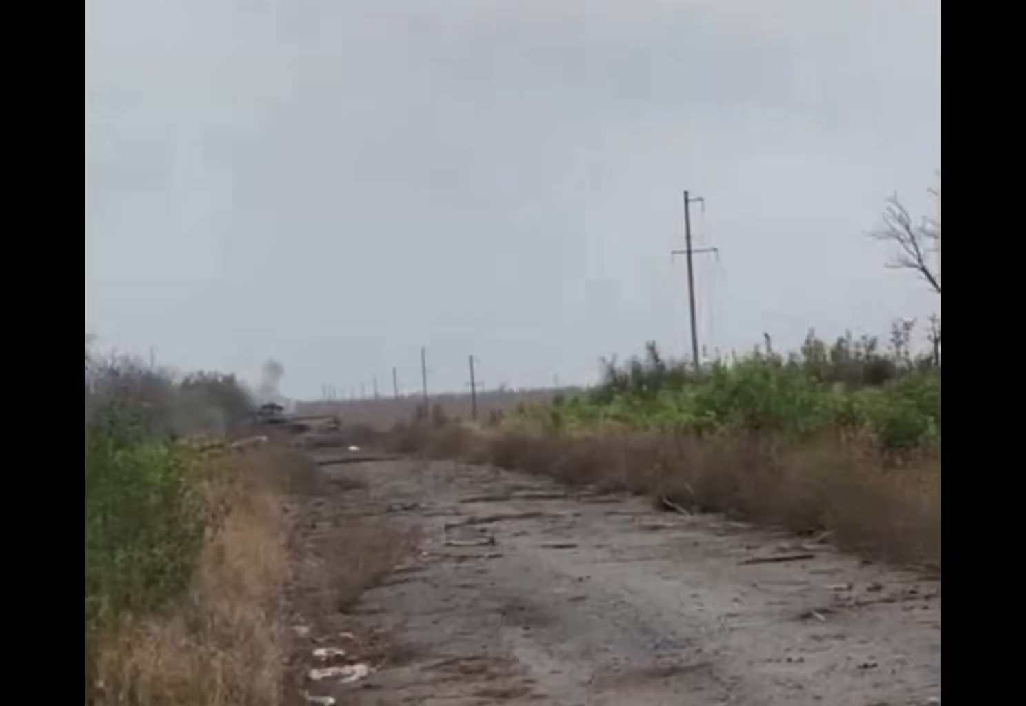 Russian is filming a passing tank which hits a landmine