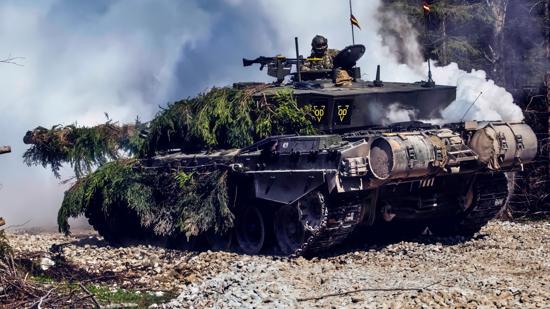 A British Army Challenger 2 Main Battle Tank (MBT) lays down a smoke screen during Spring Storm 19, Estonia's largest annual military exercise. Roughly 9,000 soldiers from Estonia, other NATO Allies and partner nations have gathered near the town of Jõhvi to engage in a collective defence exercise, strengthening their ability to work together in times of crisis.