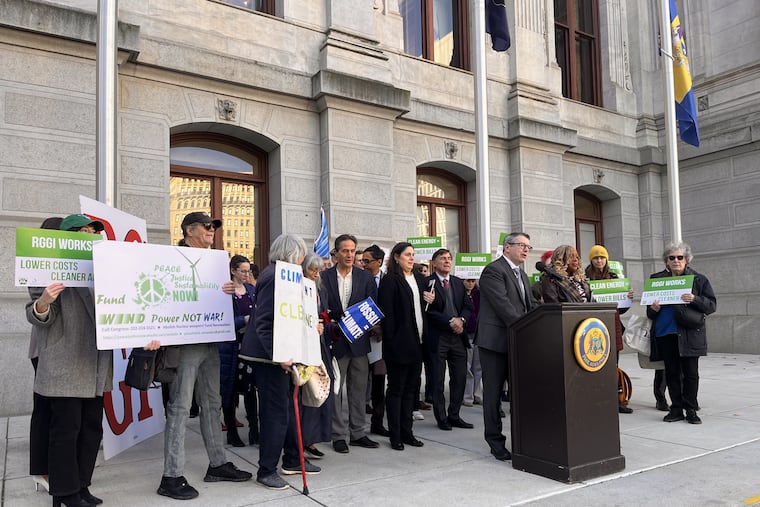 Patrick McDonnell, president and CEO of PennFuture, and Philadelphia Councilmember Jamie Gauthier speak at a lectern Thursday, Nov. 6, 2025, at a rally in support of Pennsylvania joining the Regional Greenhouse Gas Initiative. A budget deal Nov. 12, 2025 officially killed the state's entry into the program.