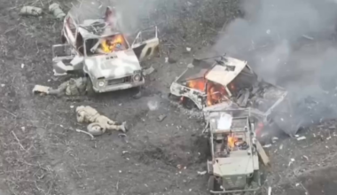 A liquidated russian assault group lying next to three burning assault vehicles. November 2025.
