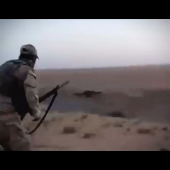 Iraqi soldiers gun down an isis suicide bomber then the bomber shreds himself to pieces after detonation. Talafar, 2017.